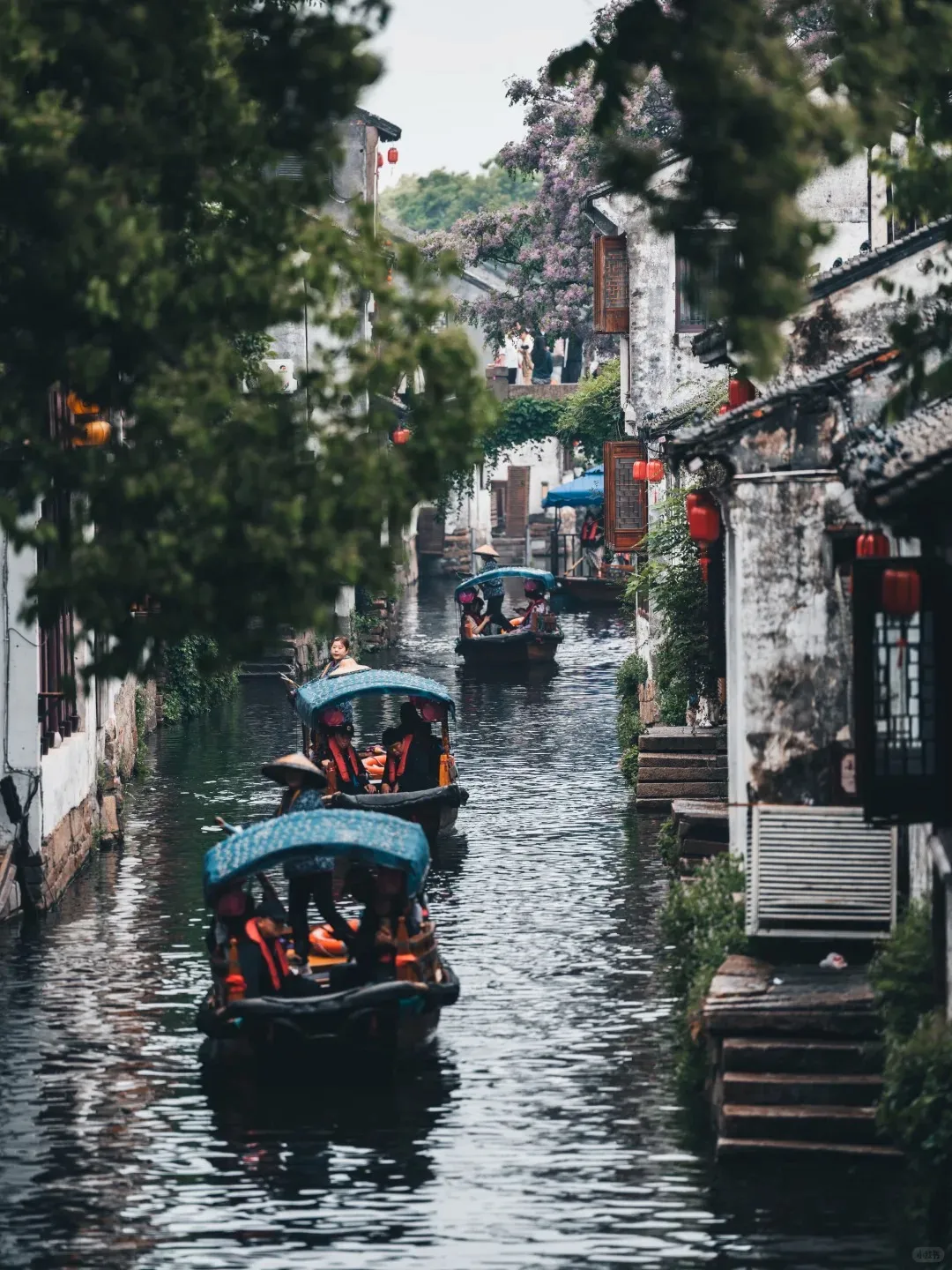 A classical Suzhou garden with pavilions and lotus ponds