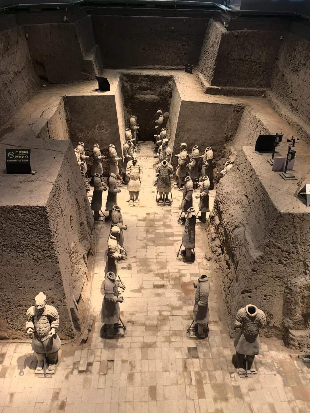 Terracotta warriors inside the main excavation hall near Xi'an
